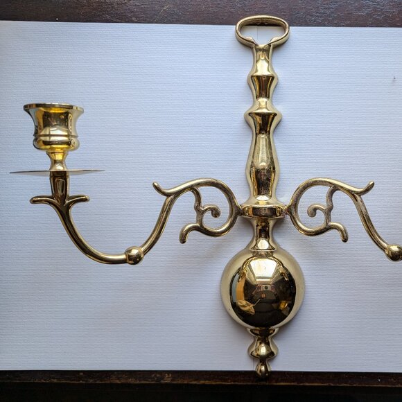 Brass candelabrafor the wall